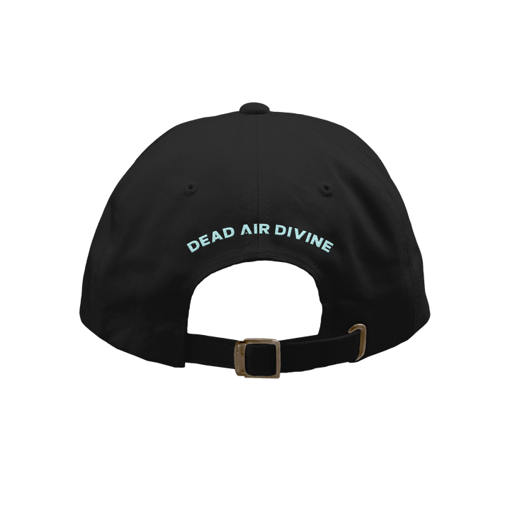 A black Dead Air Divine baseball cap is seen from the back, featuring "DEAD AIR DIVINE" in light blue above an adjustable strap with a metal clasp.
