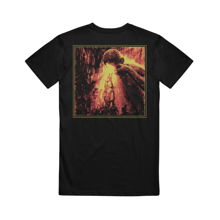 Dead Air Divine black t-shirt in a classic fit, made from 100% Gildan Heavy Cotton, showcases a vivid fiery illustration on the back of a giant figure towering over smaller people in a striking mythological scene.