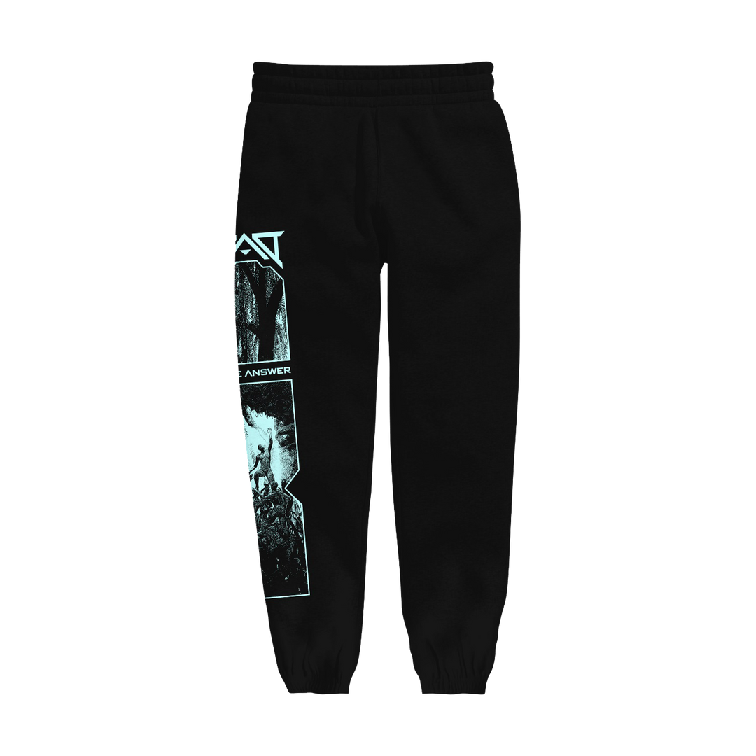Black Dead Air Divine sweatpants with elastic waistband and cuffs, pill-resistant fleece, and a vertical blue graphic featuring abstract shapes, text, and images on one leg.