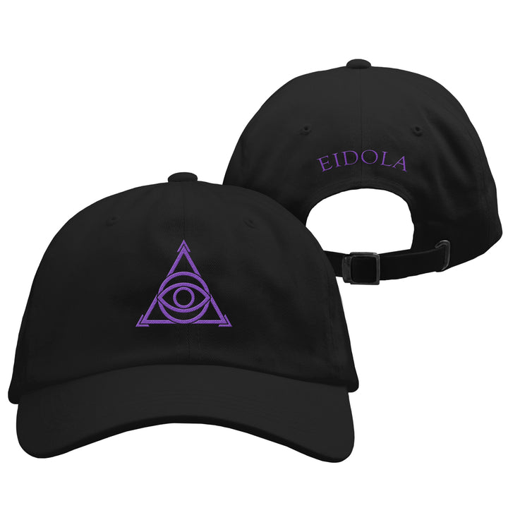 Black cap with purple triangle and eye symbol on front, 'EIDOLA' logo on back, on white background