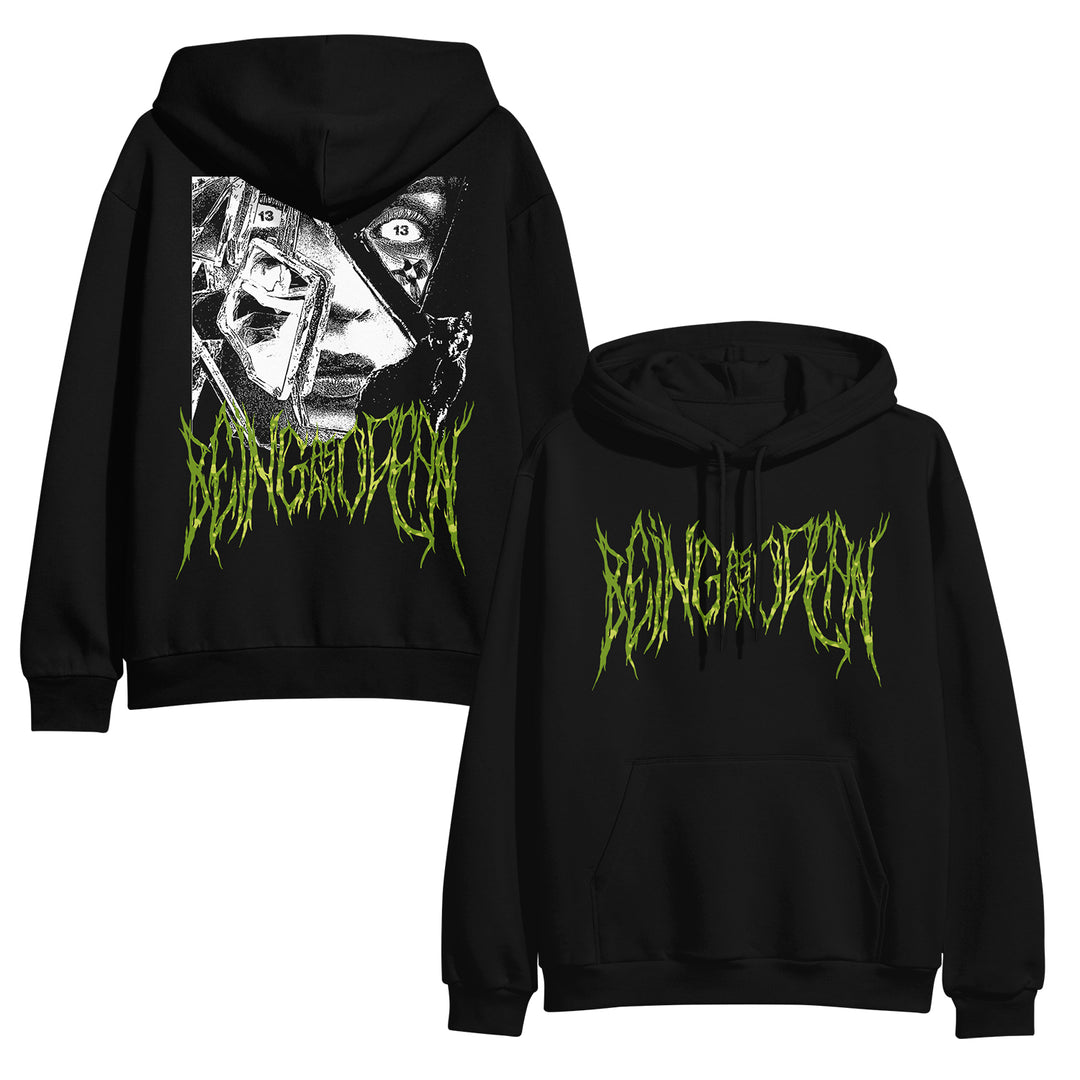 image of the front and back of a black pullover hoodie on a white background. front is on the right and has a center chest print in green that says being as an ocean. back is on the left and has a full back print of a face in a broken mirror. across the bottom says being as an ocean