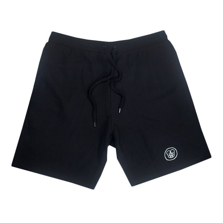 Black athletic shorts with a drawstring waistband and a small white logo near the left hem, displayed on a plain white background.