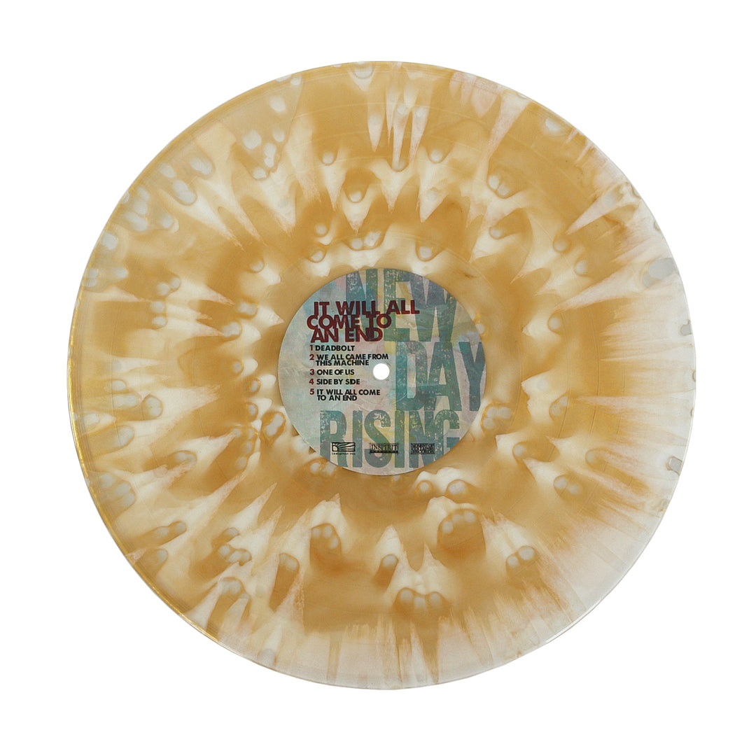 Translucent cream and tan marbled vinyl record of New Day Rising’s Stardust Torrent, with a center label listing the album title, It Will All Come to an End, and five track titles.