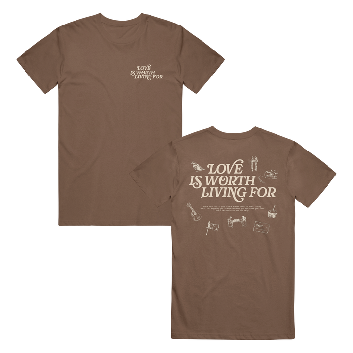 Joshua Bassett brown t-shirt featuring “Love is worth living for” text on the front left chest and large on the back, surrounded by small white illustrations like a guitar, piano, dog, and more.