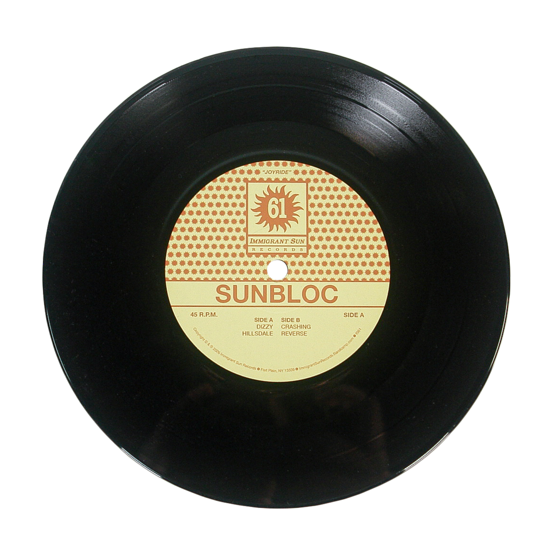 A black vinyl record featuring a yellow and red Sunbloc label with the tracks "HILLSIDE" and "REVERSE," ideal for hardcore and alternative music fans, is displayed on a white background.
