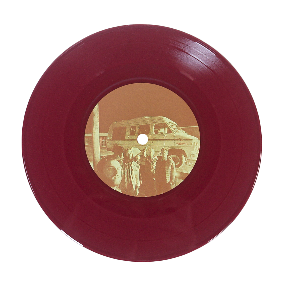 A maroon vinyl record by Sunbloc featuring a sepia center label with people in front of a van—ideal for alternative and hardcore music fans, shown on a plain white background.