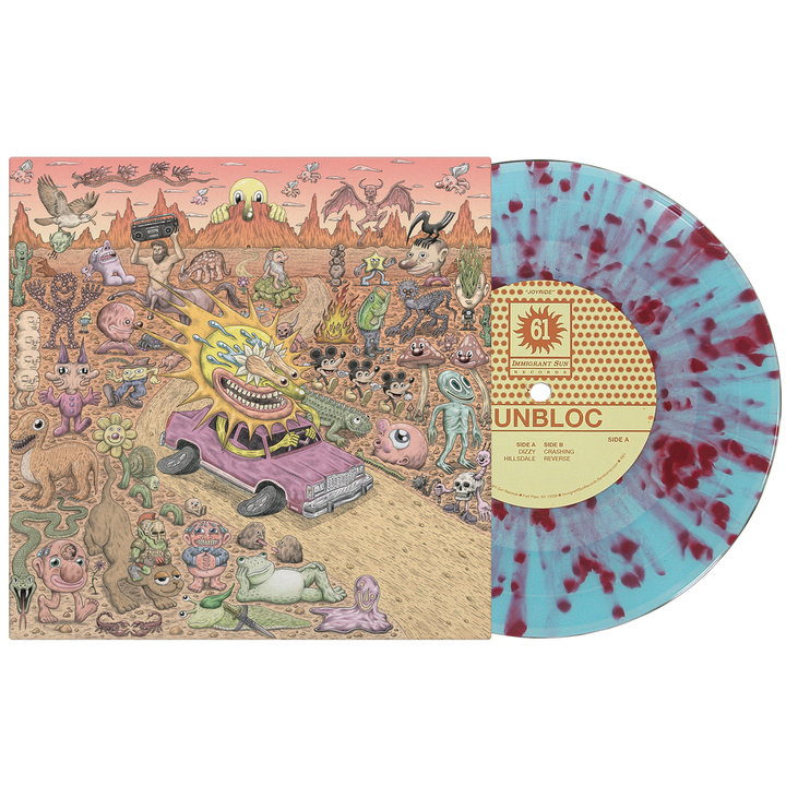 Sunbloc's vibrant album cover displays surreal, cartoon desert creatures and a purple car shooting eye-beams—reflecting hardcore and alternative vibes. Beside it sits a striking white vinyl with red splatters.