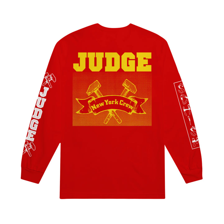 back of red long sleeve with two gavels, and “New York Crew” on the back in yellow. Sleeves feature “JUDGE,” and schism in white