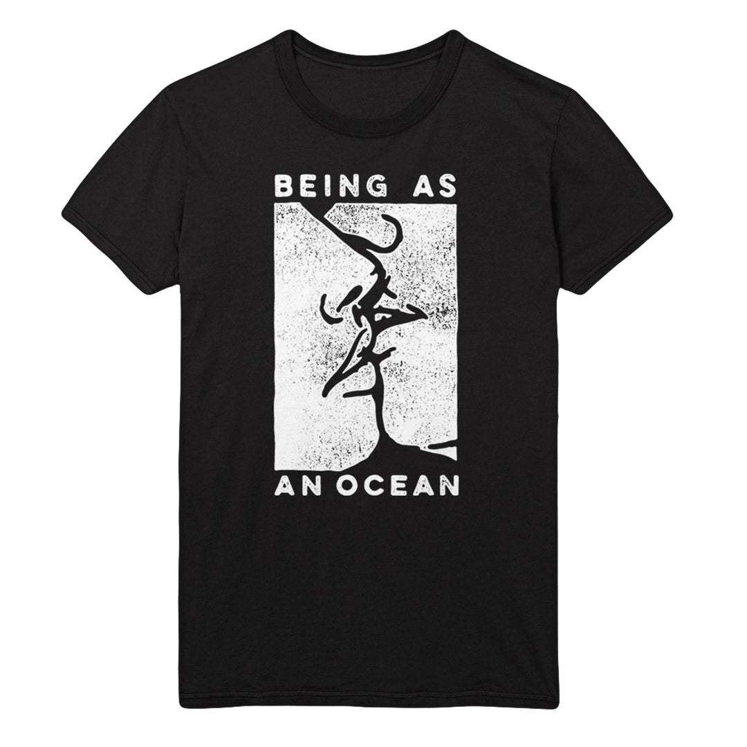 image of a black tee shirt on a white background. tee has full body print in white of a rectangle with a close up of two faces embracing in a kiss. being as is written on the top, an ocean written on the bottom.