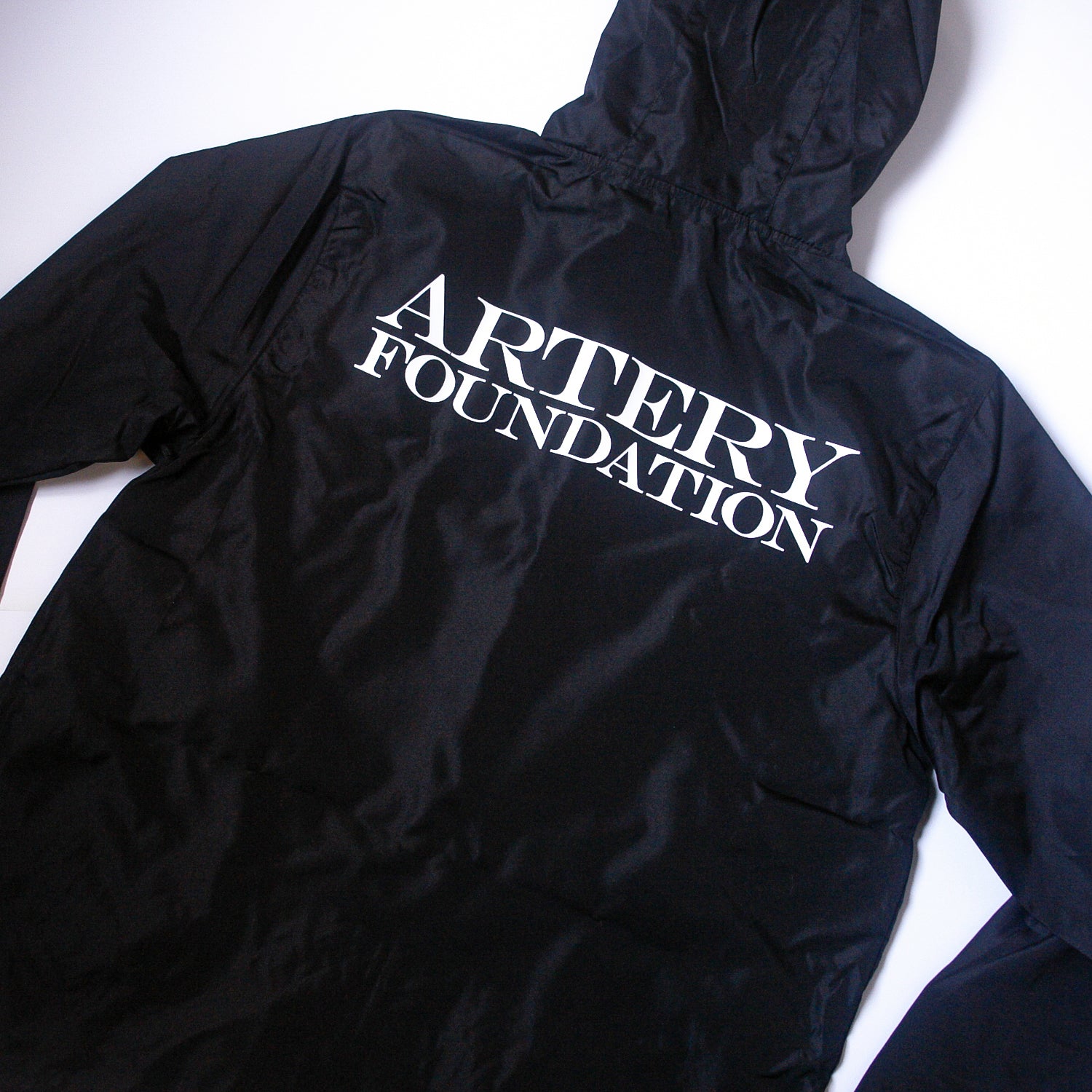 Logo - Black Zip-Up Windbreaker – MerchNow