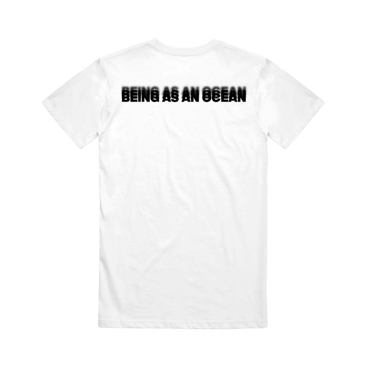 image of the back of a white tee shirt on a white background. the tee has a black print across the top shoulders in blurred text that says being as an ocean.