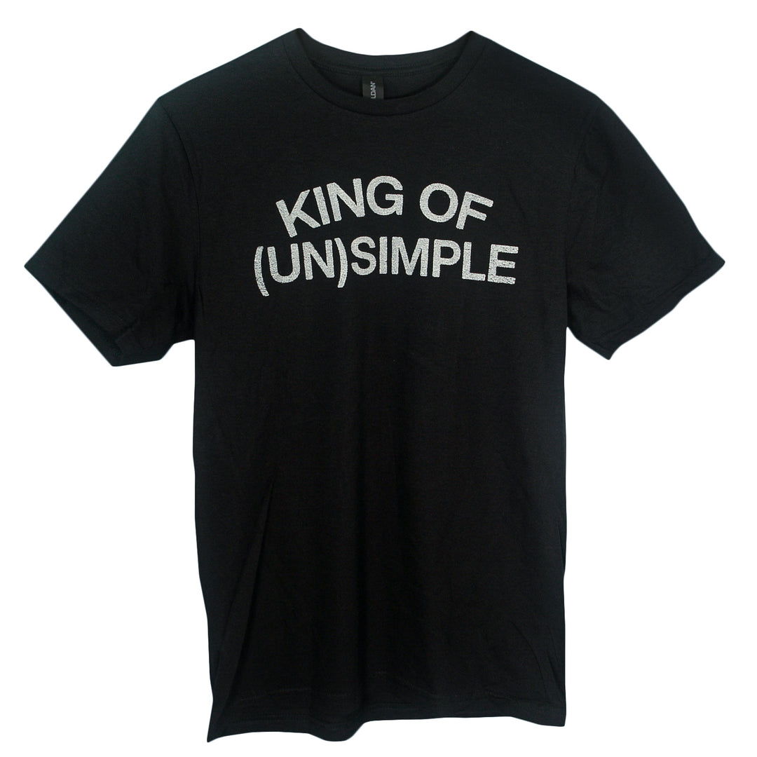A black Matt Nathanson t-shirt featuring "KING OF (UN)SIMPLE" in bold white letters on the chest, styled in a modern classic fit and made from soft ring-spun cotton.