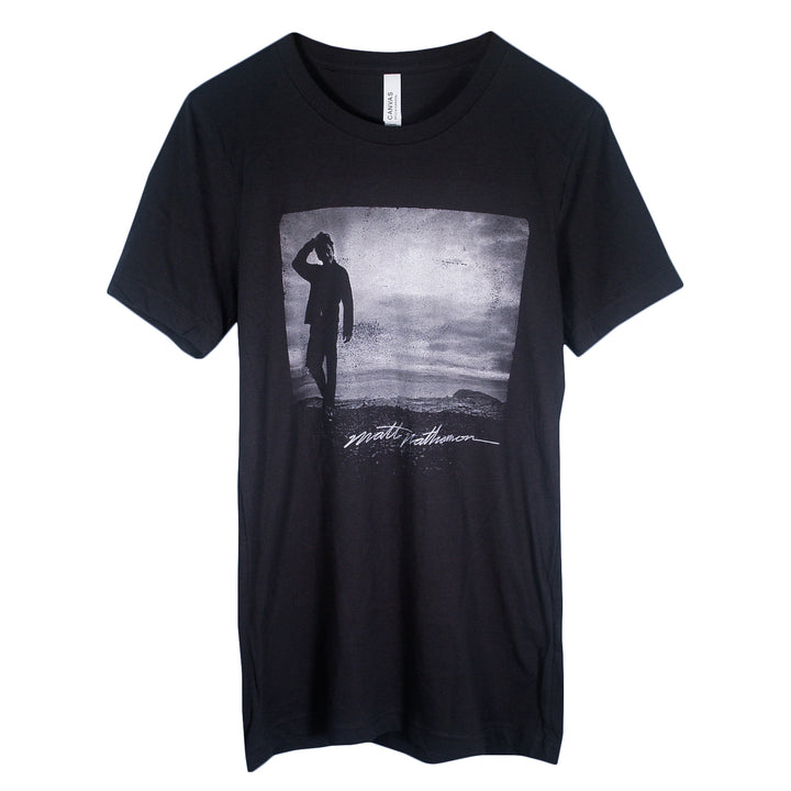 Matt Nathanson Black T-Shirt with a grayscale image of a person saluting under a cloudy sky and stylized Solo 2024 text below the image on the front.