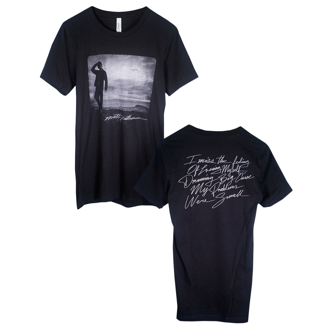 Matt Nathanson Solo 2024 black T-shirt with a grayscale water scene photo on the front and handwritten-style white text across the back.
