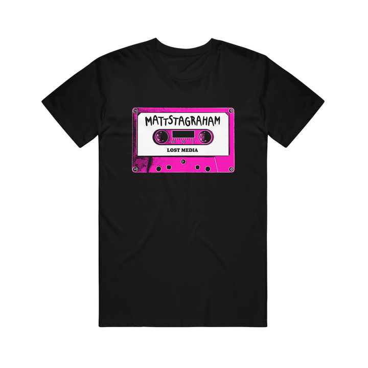 Relax in vintage style with this black Mattstagraham T-shirt, featuring a pink cassette tape graphic labeled "MATTSTAGRAHAM" and "LOST MEDIA" in bold white and black text. Crafted from 100% U.S. cotton, this classic American Apparel tee offers a laid-back fit with retro flair.