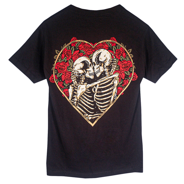 Black t-shirt with a design of two skeletons embracing inside a heart surrounded by roses on a white background.