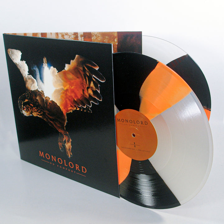 Monolord No Comfort vinyl and gatefold sleeve, featuring an owl illustration and a multi-colored orange, white, and black Twist 2xLP disc.