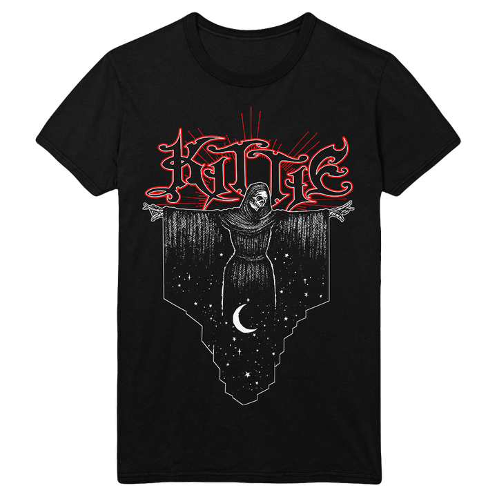 A black Kittie Comfort Colors T-shirt with "KITTIE" in red, stylized letters above a hooded figure with outstretched arms, stars, and a crescent moon. Made from garment-dyed, ring-spun cotton for softness.