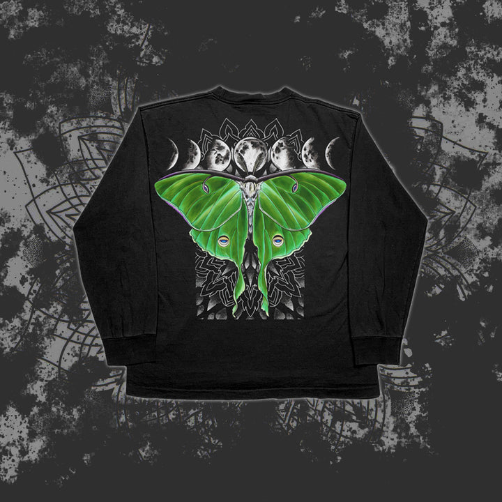A Reflections long-sleeve shirt with a large green Luna moth, geometric patterns, and lunar phases printed on the back over a textured abstract background.