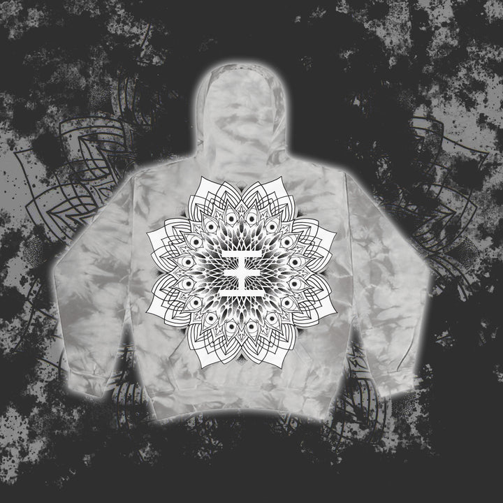 A gray Reflections tie-dye hoodie showcases a bold black and white mandala on the back over an abstract pattern—ideal for anyone who loves unique, printed pullovers.