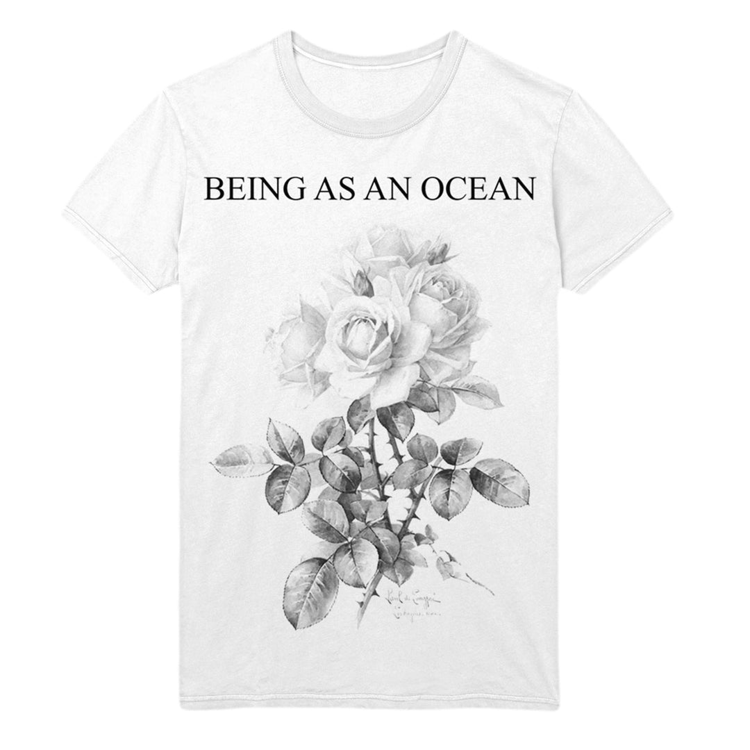 image of a white tee shirt on a white background. tee has full body print in black that says at the top, being as an ocean, with roses below