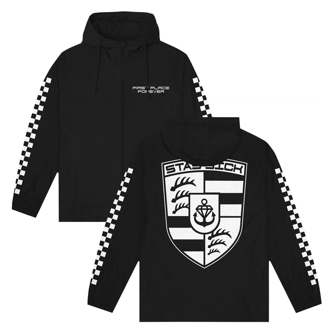Stay Sick Clothing black pullover windbreaker features white checkerboard sleeve stripes, FIRST PLACE FOREVER on the chest, and a large stylized STADTBECH crest on the back.
