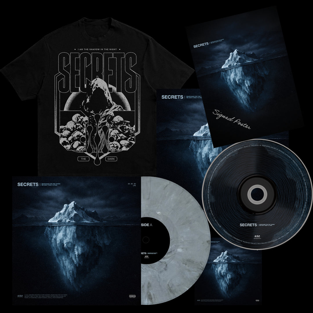 SECRETS bundle with black T-shirt, Graphite Vinyl LP, CD, signed poster, and album art from "Searching For The Things We Don't Wish To Find," depicting a dramatic iceberg under a dark sky.