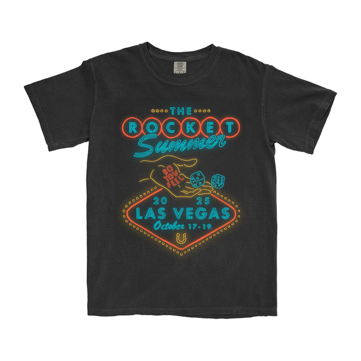 The Rocket Summer black T-shirt, crafted from soft ring-spun cotton, features a neon casino sign-inspired design with dice, poker chips, and Las Vegas 2023 dates.