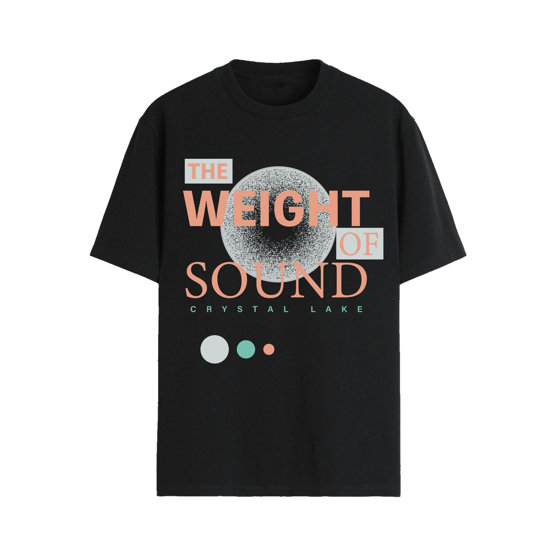 The Crystal Lake black classic fit t-shirt is 100% cotton and features "THE WEIGHT OF SOUND" text, a dotted circle graphic, and three small pastel circles (orange, mint, gray) on the front.
