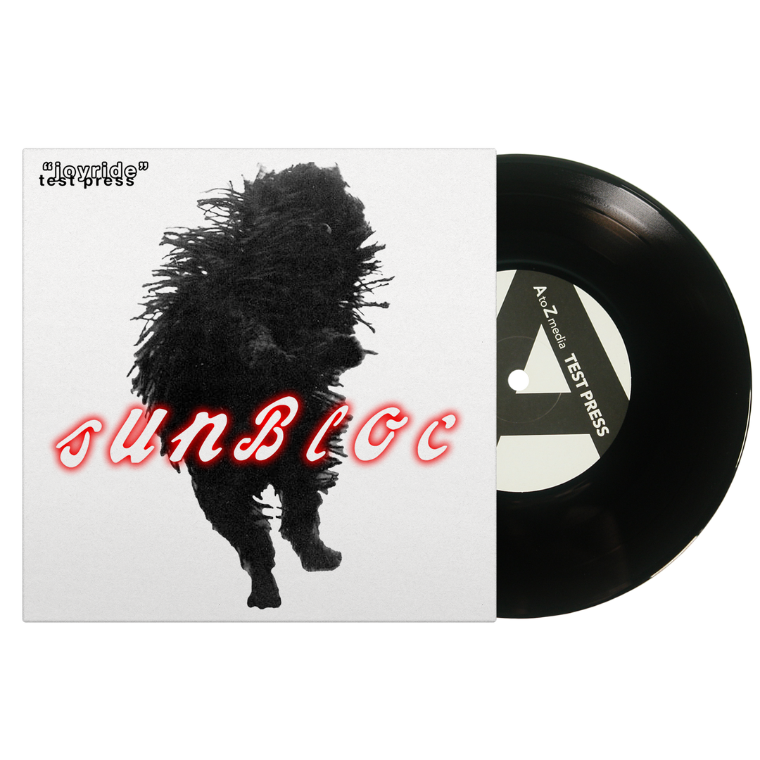 Square album cover for Sunbloc’s Joyride EP features a shaggy, shadowy figure at the center, "Sunbloc" in bold red cursive, and a black vinyl record labeled "testpress," evoking alternative music vibes.