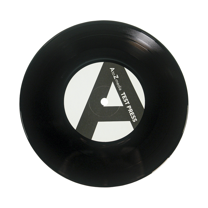A black vinyl record with a white center label reading "A to Z Media TEST PRESS" in bold, featuring a large letter A, reflects Sunbloc’s raw alternative energy on a plain white surface.