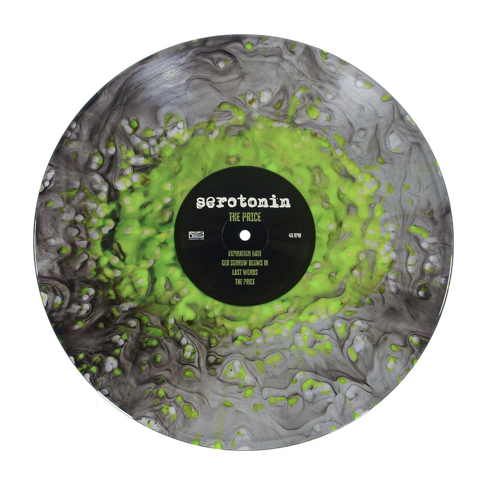 Vinyl record with a black and neon green marbled pattern and a center label for the emo punk band Serotonin, featuring the album title The Price and four track names.