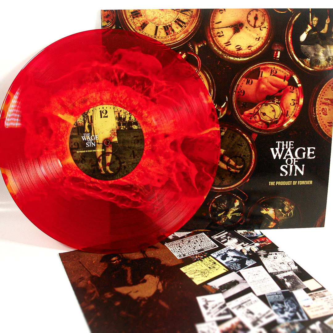 A 140g red vinyl record by The Wage Of Sin with clock artwork is displayed beside its album cover, featuring sepia clocks. An insert with photos and text is placed in front.