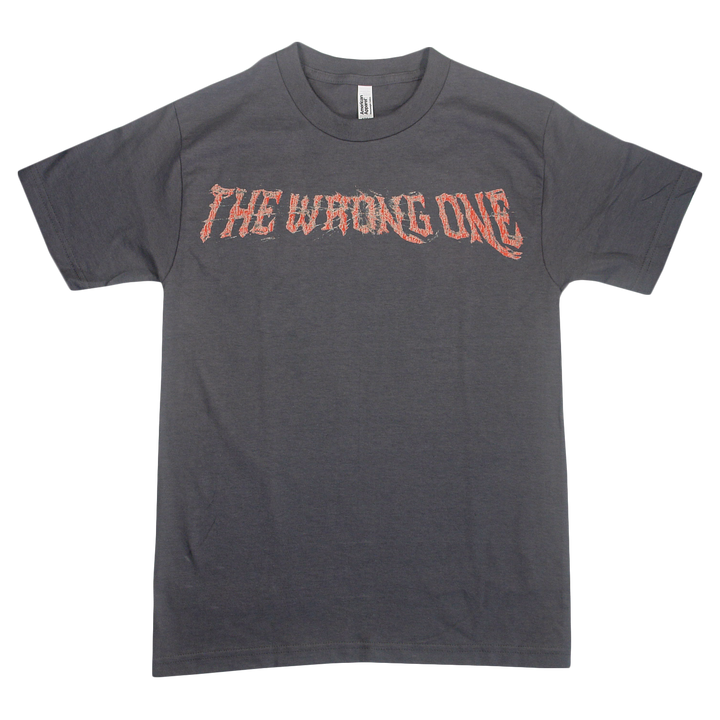 A dark gray Sorry X T-shirt crafted from premium U.S. cotton, featuring “THE WRONG ONE” in jagged red and white lettering across the chest. Its relaxed fit guarantees all-day comfort and effortless style.