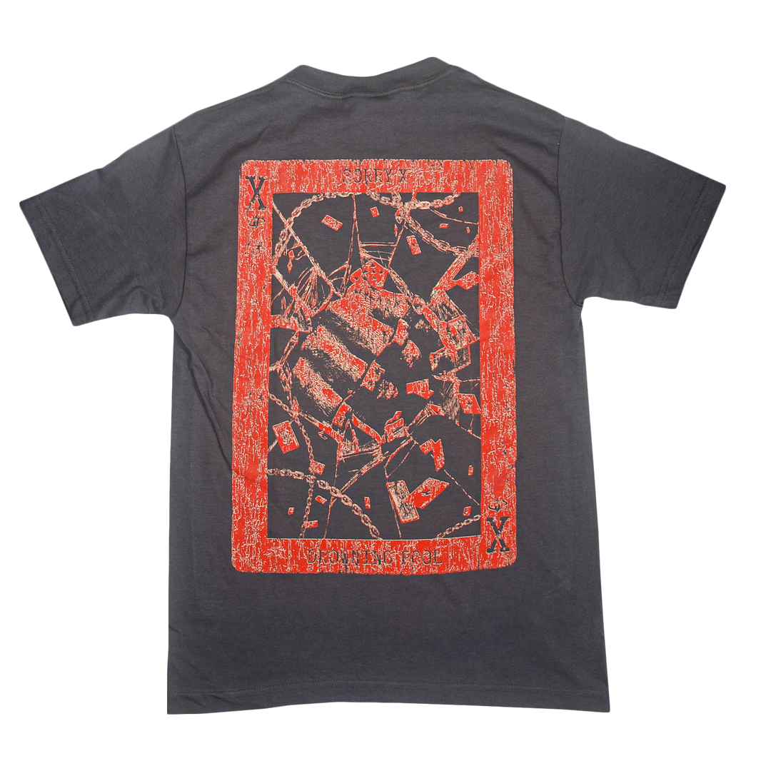 A dark gray, relaxed fit T-shirt by Sorry X, crafted from premium U.S. cotton and featuring a large abstract red and orange rectangular design with jagged shapes and patterns on the back.