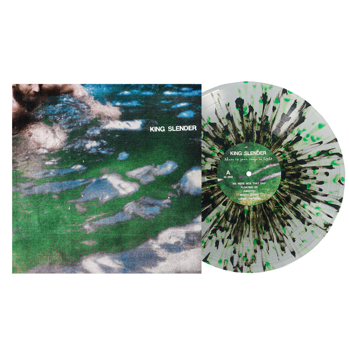 A 12" black and green splatter vinyl sits beside its cover, which shows a blurred underwater swimmer. Emotional hardcore by King Slender, with the band's name featured on both the record and album cover.