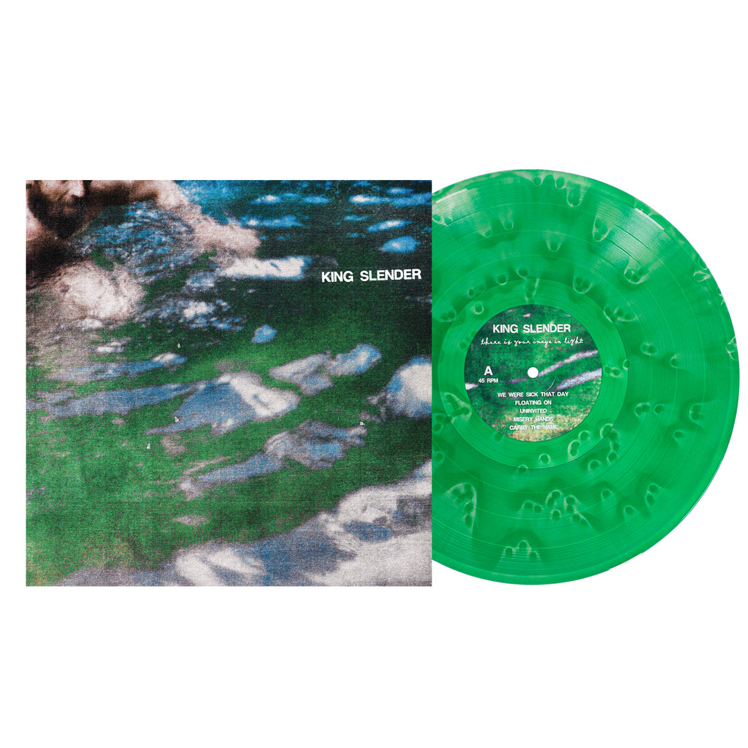 A green marbled vinyl record, partially out of its cover featuring a blurred water image, highlights King Slender’s emotional hardcore sound.