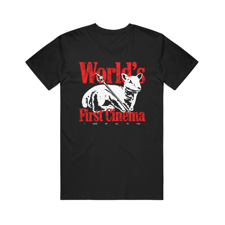 Black Comfort Colors T-shirt by World’s First Cinema featuring a white dog and bird graphic, bold red “World’s First Cinema” text, and smaller “I GAVE MY ALL TO YOU”—a standout pick for fans of unique printed shirts.