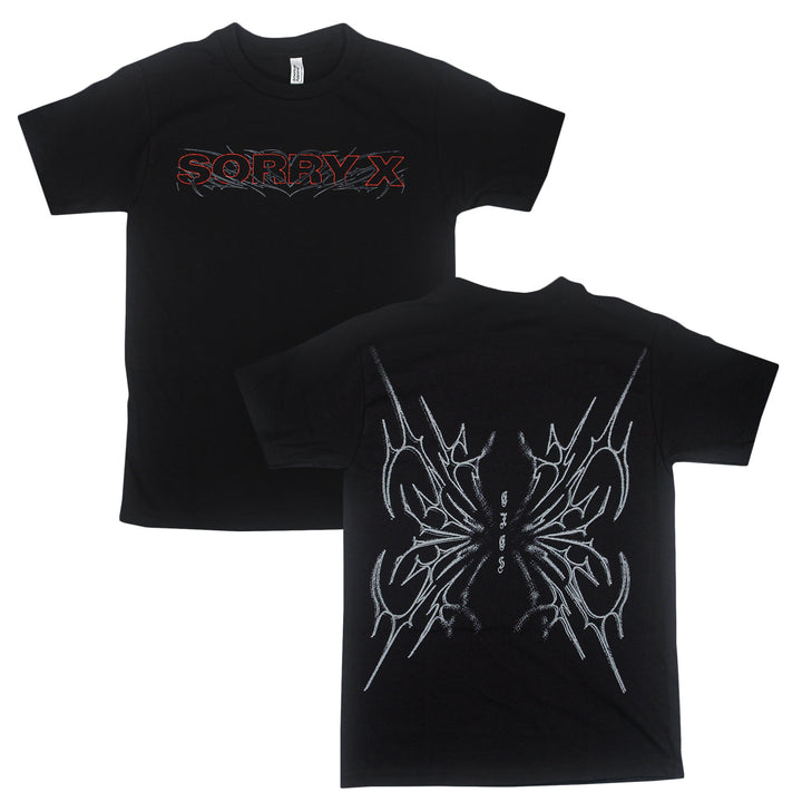 Black t-shirt by Sorry X featuring “SORRY X” in red and gray on the front, and a large abstract spiked white graphic with “GIVEN” text centered on the back. Made from 100% U.S. cotton for superior comfort, this relaxed fit American Apparel tee offers bold style and quality craftsmanship.