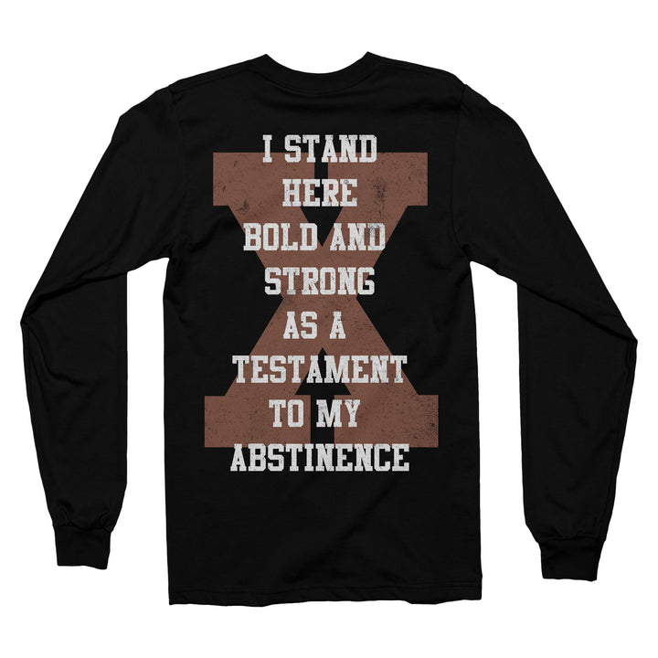 Shai Hulud black long-sleeve shirt made from Comfort Colors, featuring a large brown X on the back with white text: I stand here bold and strong as a testament to my abstinence.