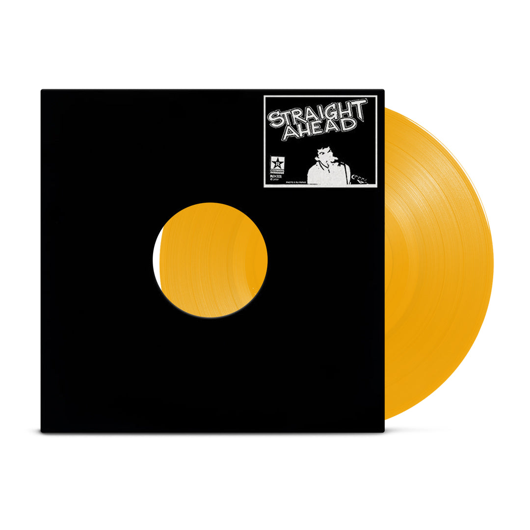 An orange vinyl record partially slides out of a black sleeve with a circular cutout. The sleeve, by Straight Ahead, features an illustrated figure and the band's name in the top right, marking it as their self-titled LP.