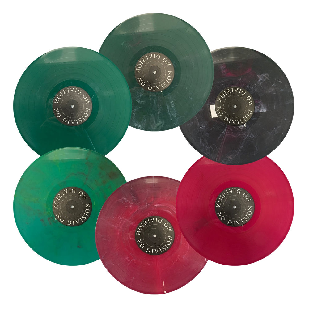 Six marbled vinyl records from No Division, arranged in a hexagon and labeled with the brand name. This limited edition set features striking green, red, and black post-hardcore records for a bold visual display.
