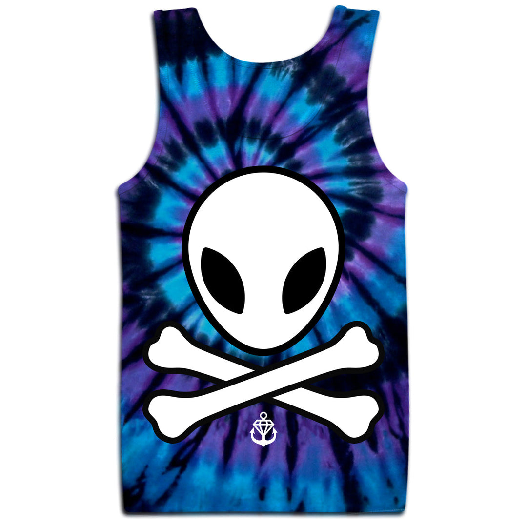 Stay Sick Clothing’s tank top features a blue and purple alien tie dye, showcasing a large white alien head over black-outlined crossbones, with an anchor symbol near the hem.