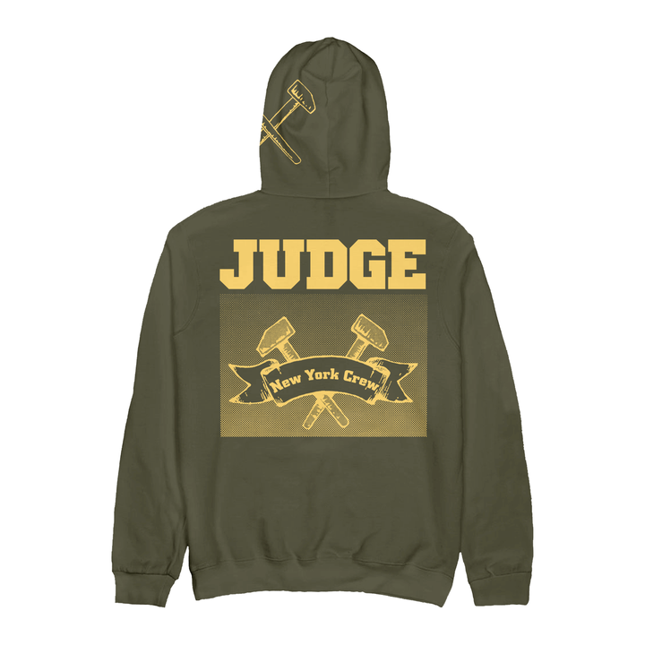 Olive green IND4000 hoodie featuring the text JUDGE above a graphic of two crossed hammers and a banner reading New York Crew, with a small hammer icon on the hood.