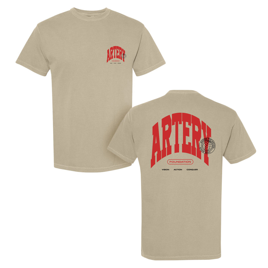 Beige Comfort Colors T-Shirt by Artery Foundation, made from soft ring-spun cotton. Features ARTERY in bold red on front left chest and back, plus small text, a globe, and VISION, ACTION, CONSULT on the garment-dyed back.