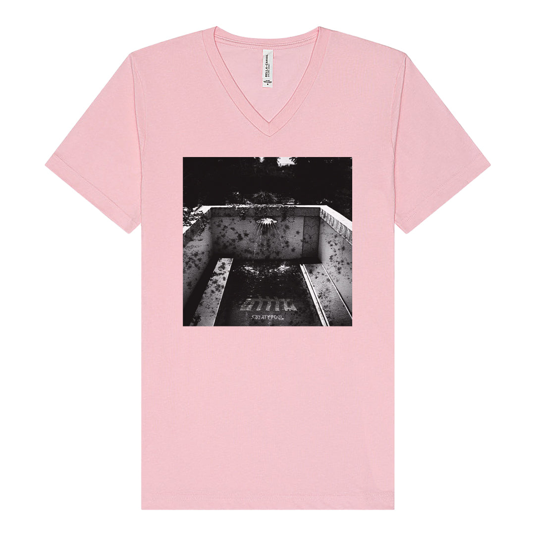The OTTTO light pink V-neck T-shirt features a black-and-white photo of a concrete staircase with overgrown plants and shadows printed front center. Made from high quality fabric. Now available for presale.