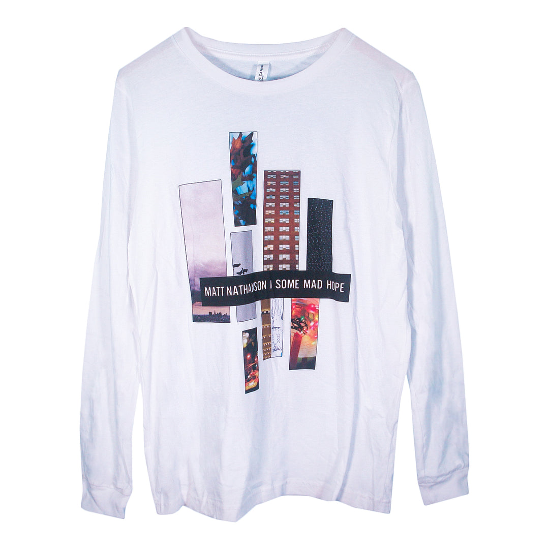 A white Matt Nathanson long sleeve shirt featuring abstract rectangular photo prints and MATT NATHANSON | SOME MAD HOPE text across the front—a great pick for fans of unique printed long sleeves.