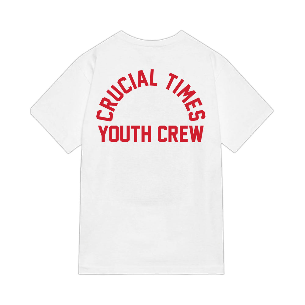 The Crucial Times white Comfort Colors T-shirt features bold red "CRUCIAL TIMES" arched above "YOUTH CREW" on the back. Now available for presale—ideal for fans of standout printed styles.