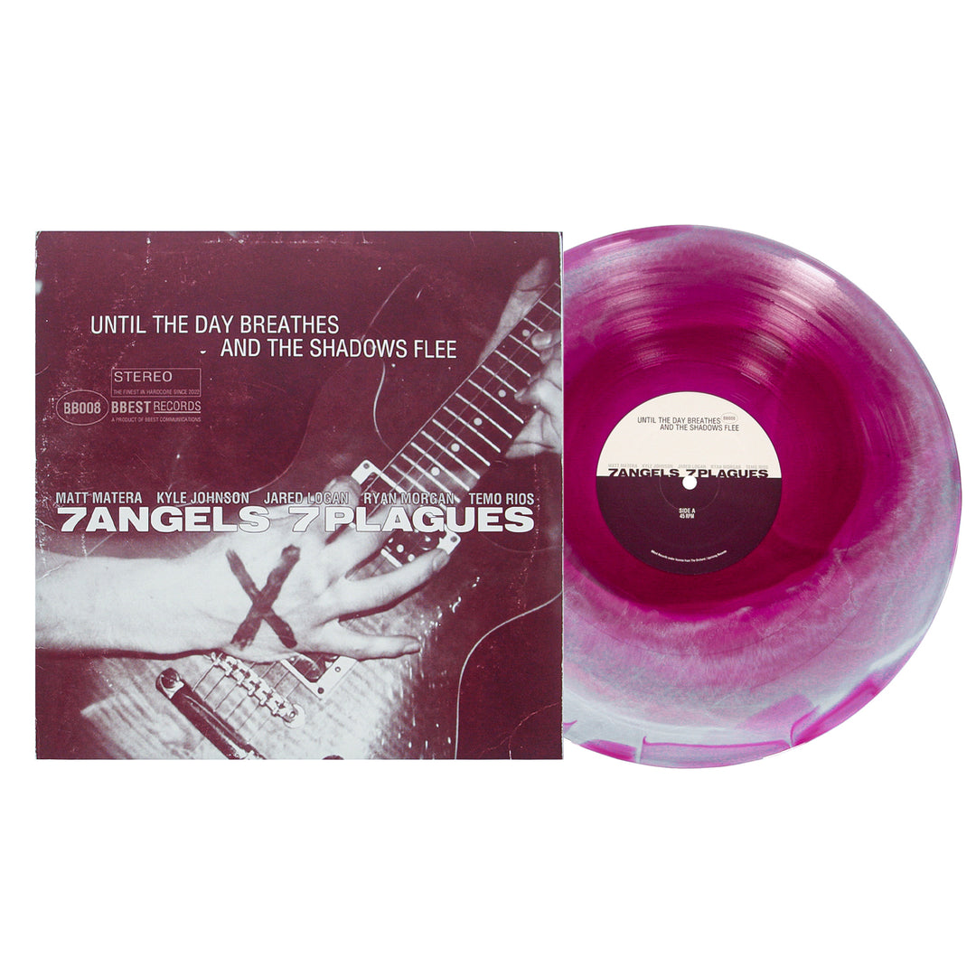 A pink and white tri-color marbled vinyl by 7 Angels 7 Plagues is shown beside its album cover, which displays a close-up of guitar playing with a red X on the hand and reads “Until The Day Breathes and The Shadows Flee.”.
