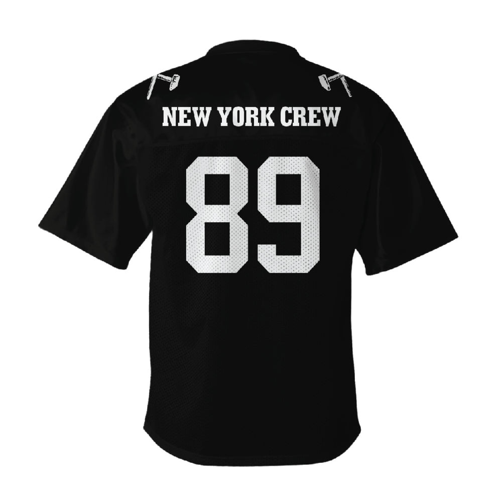 A Judge brand black sports jersey with a v-neck collar, "NEW YORK CREW" in bold white letters above a large white number 89 on the back, made from breathable polyester tricot mesh for comfort.
